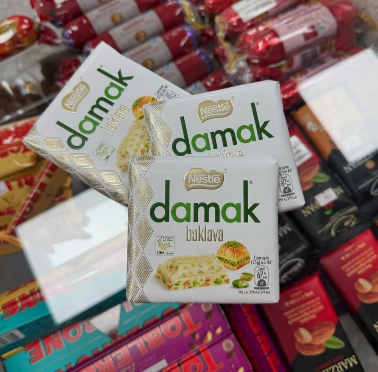 Белый шоколад NESTLE damak baklava с отборной фисташкой и настоящей турецкой пахлавой  60 гр